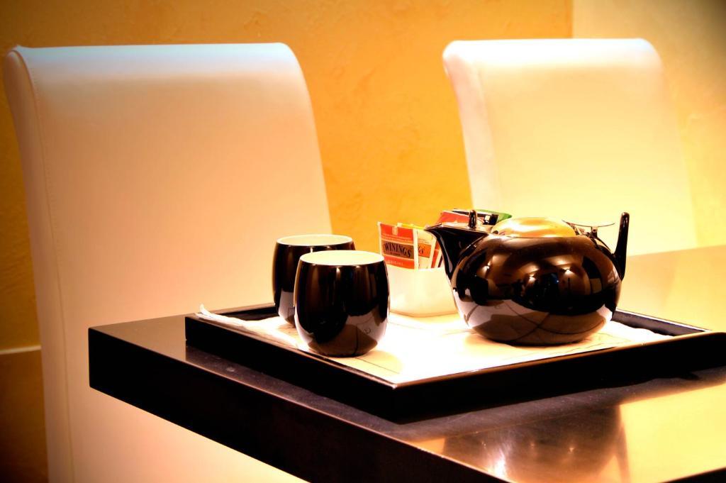 Style Hotel Milan Bagian luar foto